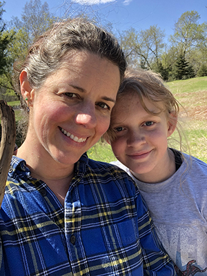 Photo of Rev. Root on a hike with daughter Maisy