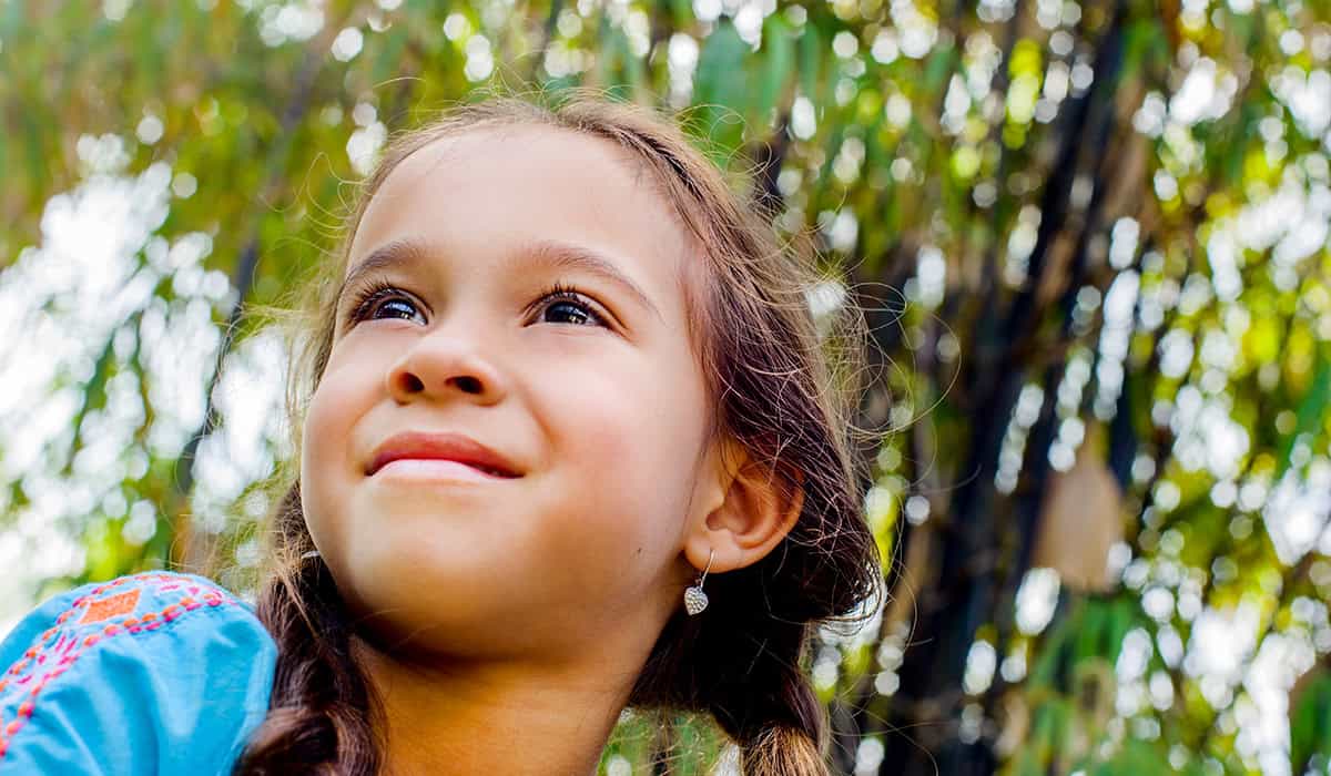 Happy girl filled with wonder